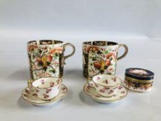 TWO MINIATURE "ROYAL CROWN DERBY" CUP AND SAUCERS,