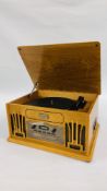 A CLASSIC RETRO STYLE CD, RECORD, RADIO AND CASSETTE PLAYER - SOLD AS SEEN.