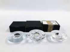 TWO ORREFORS GLASS TEALIGHT HOLDERS + ONE OTHER SIMILAR EXAMPLE
