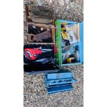 A LARGE TIN CHEST CONTAINING AN ASSORTMENT OF HAND TOOLS ALONG WITH A BLACK PAINTED VINTAGE WOODEN