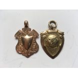 MEDALS: TWO 9 CARAT GOLD WATCH FOBS, BOTH HALLMARKED .375 WITH MAKERS INITIALS J.W.T WEIGHT 11.8g.