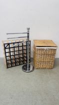 A MODERN CANE LINEN BASKET AND CHROME FINISH TOWEL RAIL AND WINE RACK