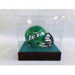 A VINTAGE AMERICAN FOOTBALL RIDDELL "JETS" HELMET IN DISPLAY CASE BEARING SIGNATURE "BROWNING NAGLE