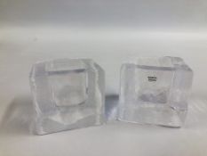 A PAIR OF SWEDISH KOSTA BODA SQUARE GLASS CANDLE HOLDERS, ONE RETAINING ORIGINAL LABEL - H 7.5CM 8.