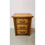 A MODERN WAXED PINE 3 DRAWER BEDSIDE CHEST