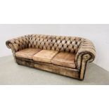 A LEATHER BUTTON BACK CHESTERFIELD SOFA WITH STUD DETAIL.