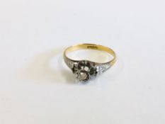 AN UNMARKED YELLOW METAL SOLITAIRE DIAMOND RING.