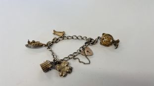 VINTAGE 925 SILVER GATE BRACELET WITH 5 CHARMS ATTACHED.