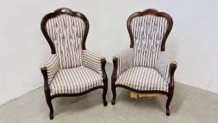 A PAIR OF VICTORIAN STYLE BUTTON BACK NURSING CHAIRS, UPHOLSTERED IN BLUE STRIPED MATERIAL.