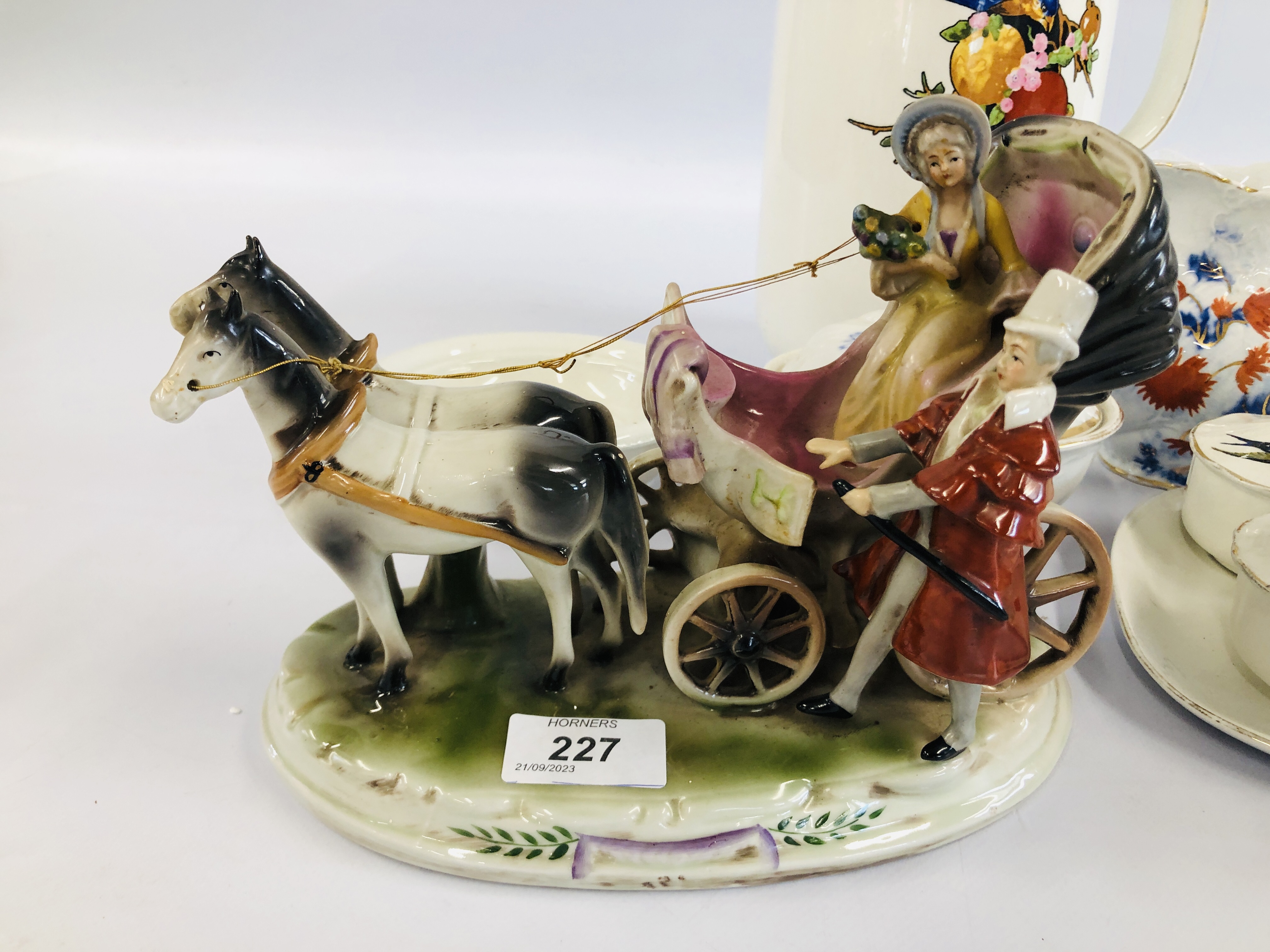 A PORCELAIN CABINET ORNAMENT OF A LADY ON HER HORSE DRAWN CARRIAGE BEARING MARKERS MARK MADE IN GDR - Image 2 of 7