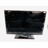 A SAMSUNG 40 INCH TV MODEL UE40B6000VW COMPLETE WITH REMOTE CONTROL - SOLD AS SEEN.