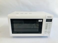 A WHITE PANASONIC MICROWAVE - SOLD AS SEEN.
