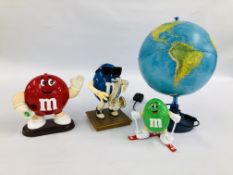 3 MARS INCORPORATED M & M FIGURES ALONG WITH AN LUMINOUS WORLD GLOBE.