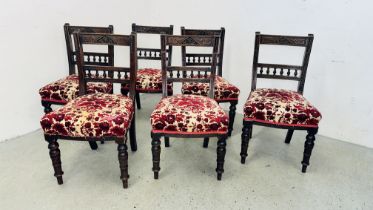 A SET OF 6 EDWARDIAN OAK DINING CHAIRS WITH TURNED AND CARVED DETAILING.