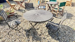 HARDWOOD AND WROUGHT METAL PATIO SET COMPRISING CIRCULAR FOLDING TABLE AND THREE FOLDING CHAIRS.
