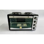 AN ANDREW JONES MINI OVEN - SOLD AS SEEN.