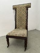 AN ANTIQUE MAHOGANY PRAYRE HIGH BACK CHAIR WITH TAPESTRY FELT AND BARLEY TWIST SUPPORT A/F.