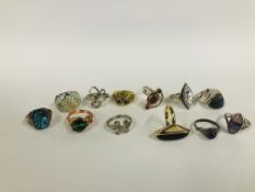 A GROUP OF 12 ASSORTED DRESS RINGS TO INCLUDE DESIGNER WHITE METAL STONE SET EXAMPLES.