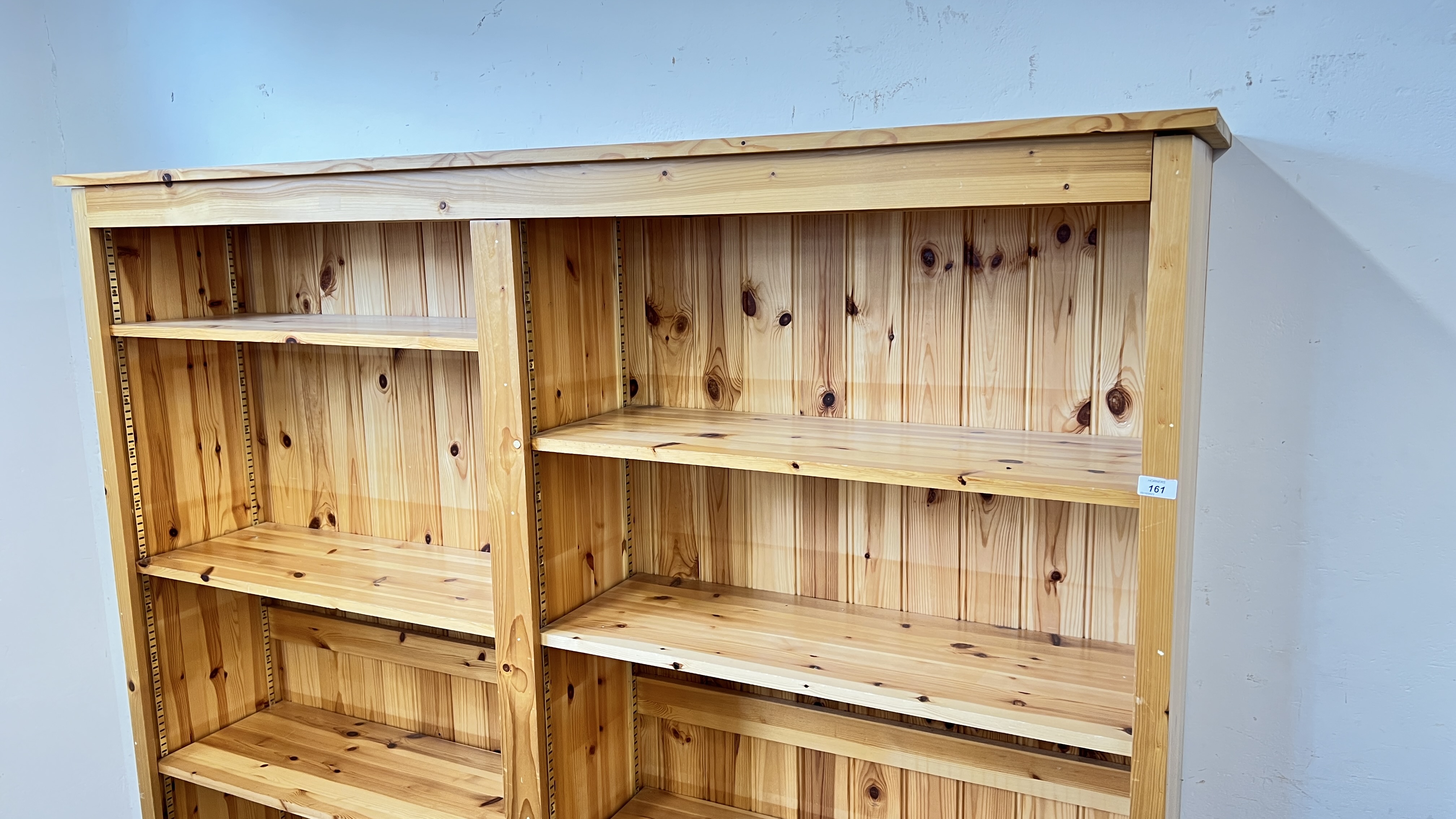 A SOLID PINE DOUBLE BOOKSHELF WITH ADJUSTABLE SHELVES, W 180CM, D 36CM, H 183CM. - Image 2 of 7