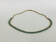 AN ELEGANT VINTAGE CHOKER STYLE NECKLACE SET WITH MULTIPLE TURQUOISE STONES, THE CLASP STAMPED 14.