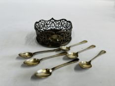 AN ANTIQUE SILVER OPEN WORK COASTER DIAM 12CM ALONG WITH 6 ASSORTED SILVER TEASPOONS.