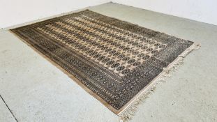 A PLUSH PILE FAWN AND BLACK PATTERN EASTERN DESIGN CARPET 270 X 191CM.