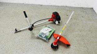 A TRUESHOPPING SPLIT SHAFT PETROL GRASS TRIMMER COMPLETE WITH ACCESSORIES AND INSTRUCTIONS - SOLD