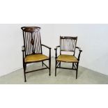 TWO EDWARDIAN MAHOGANY STRUNG BACK ELBOW CHAIRS WITH INLAID DETAIL AND STRETCHER SUPPORTS.