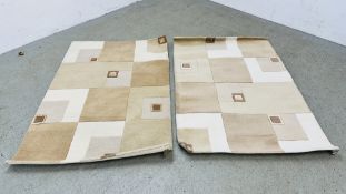 A PAIR OF DESIGNER DEEP PILE "PUKON" BEIGE PATTERNED RUGS EACH 180 X 125CM.