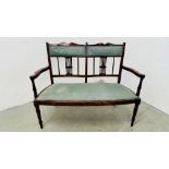 EDWARDIAN MAHOGANY 2 SEAT SOFA WITH FRETT WORK SUPPORT BACK AND GREEN UPHOLSTERY.