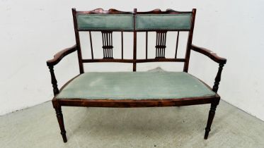 EDWARDIAN MAHOGANY 2 SEAT SOFA WITH FRETT WORK SUPPORT BACK AND GREEN UPHOLSTERY.