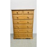 A WAXED PINE 2 OVER 5 DRAWER CHEST - W 92CM X D 44CM X H 131CM.