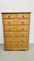 A WAXED PINE 2 OVER 5 DRAWER CHEST - W 92CM X D 44CM X H 131CM.