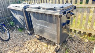 TWO LARGE BLACK WHEELED BINS WITH LIDS