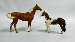 TWO BESWICK HORSES TO INCLUDE A PALOMINO EXAMPLE.