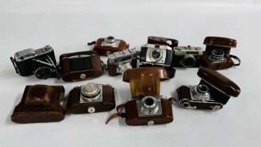 A GROUP OF 10 VINTAGE SLR CAMERAS TO INCLUDE AGFA ISOLETTE, BRAUN NURNBERG, EPSILON, BRAUN PAXETTE,
