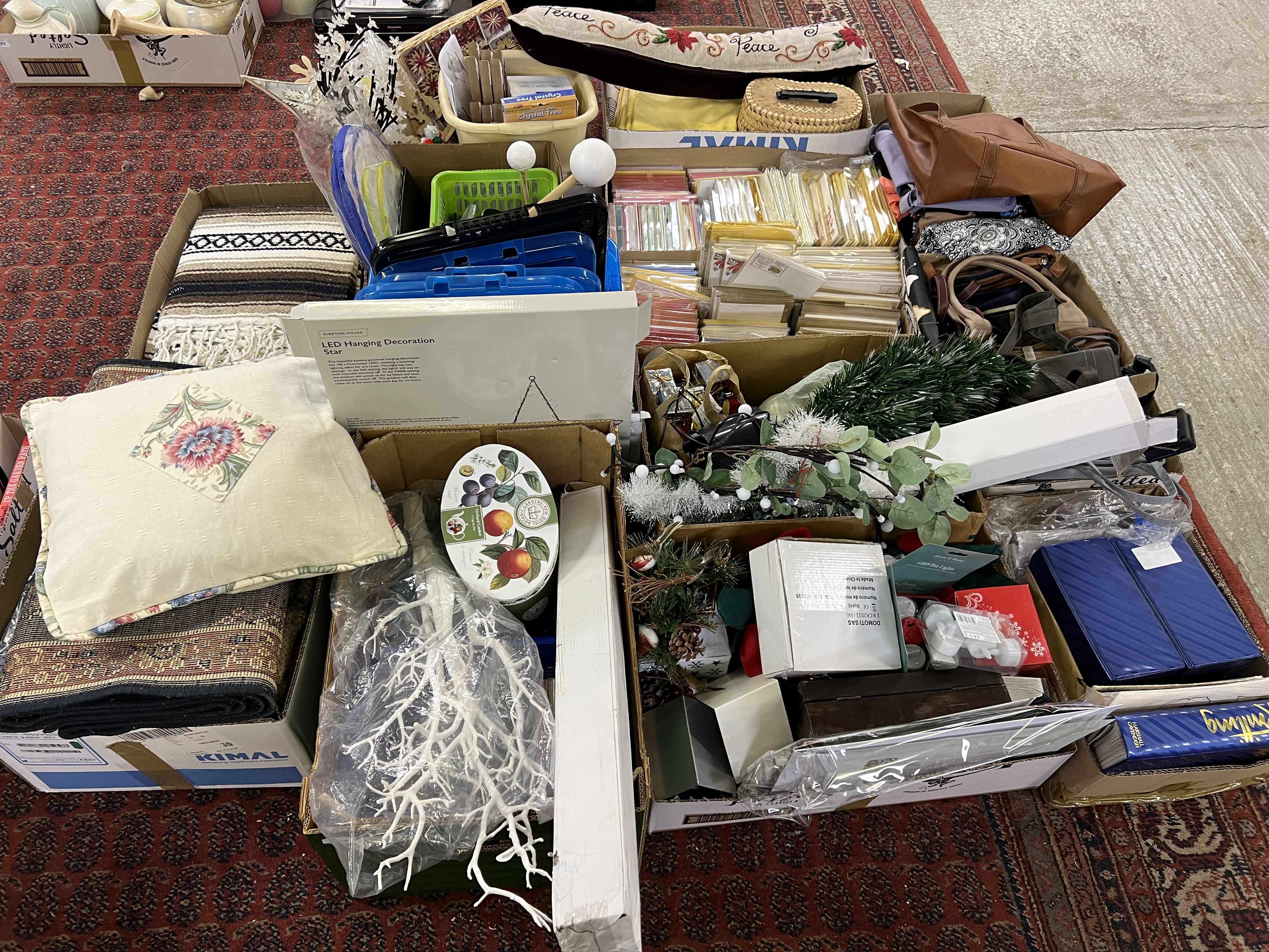 13 X BOXES CONTAINING AN EXTENSIVE GROUP OF XMAS DECORATIONS, CARDS, LINEN, CLOTHING AND HANDBAGS,