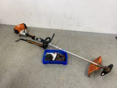 STIHL FS 91R PETROL STRIMMER AND TRAY OF SPARES.