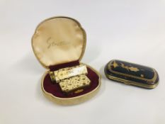 AN ELABORATE VINTAGE "STRATTON" LIPSTICK HOLDER AND MATCHING PILL BOX IN ORIGINAL FITTED BOX ALONG