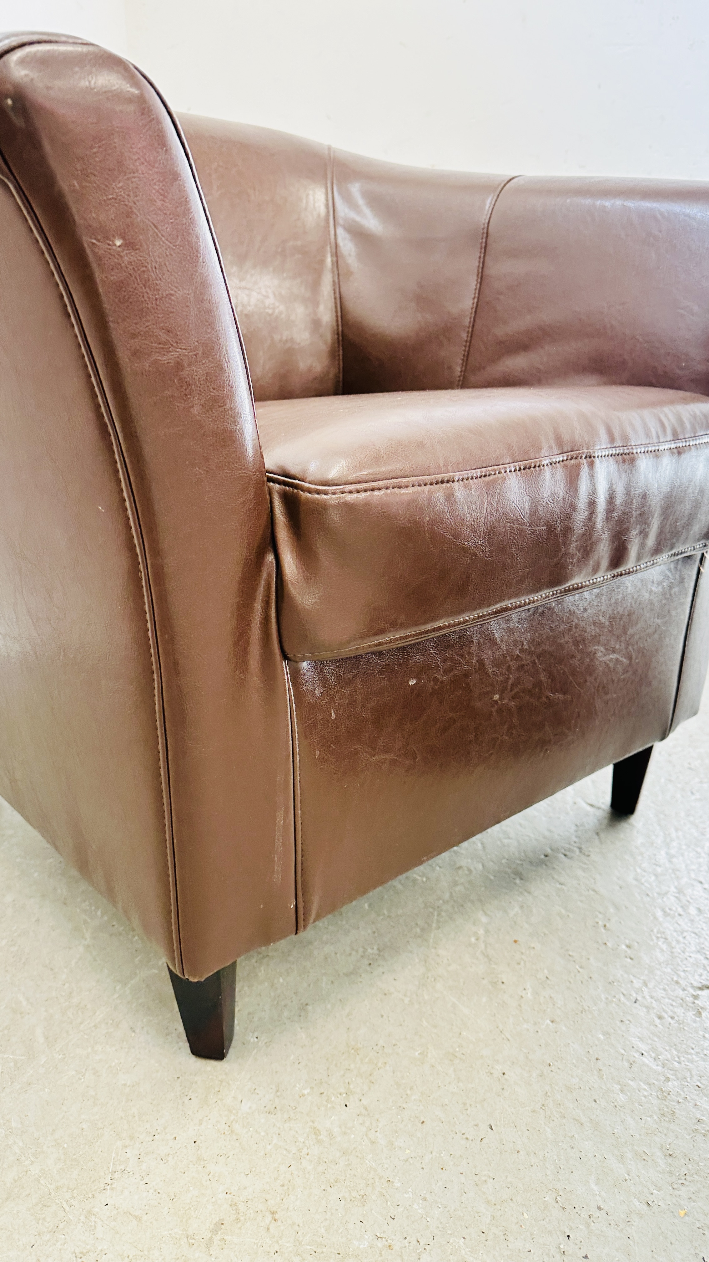 A MODERN BROWN FAUX LEATHER TUB CHAIR ALONG WITH MATCHING BEAN BAG FOOT REST. - Image 5 of 11