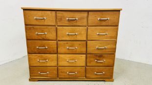 A MODERN CHERRYWOOD FINISH MULTI DRAWER CHEST MANUFACTURED BY HEALS FURNITURE COMPANY (15 DRAWER),