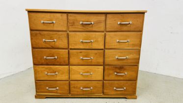 A MODERN CHERRYWOOD FINISH MULTI DRAWER CHEST MANUFACTURED BY HEALS FURNITURE COMPANY (15 DRAWER),