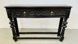 A CARVED OAK SIDE TABLE WITH SINGLE DRAWER, 110CM WIDE X 23CM D X 76CM H.