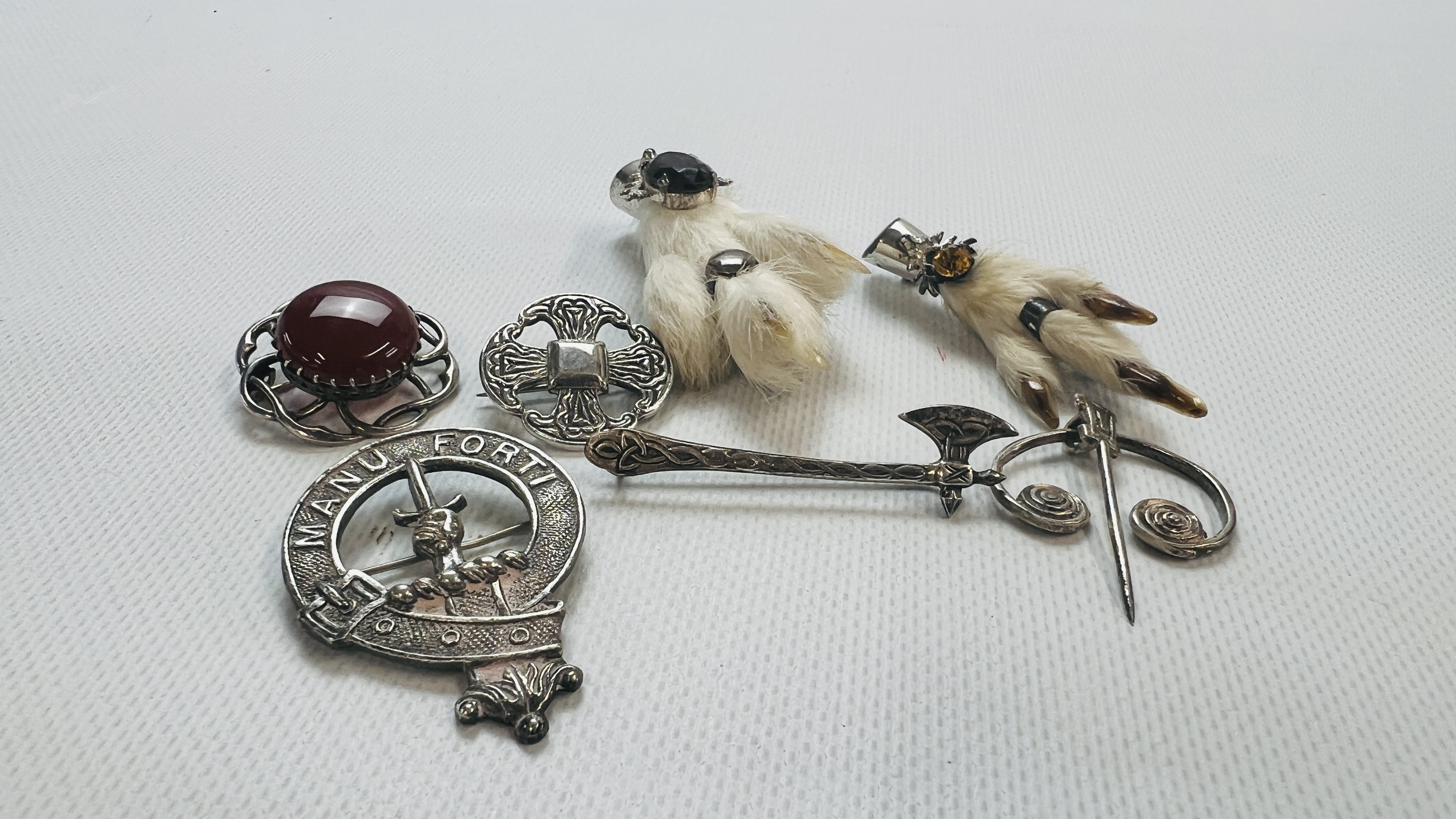 GROUP OF MAINLY SILVER SCOTTISH BROOCHES INCLUDING 2 BY ROBERT ALLISON,