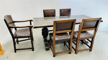 A REPRODUCTION OAK REFECTORY TABLE AND A SET OF FIVE OAK CHAIRS, INCLUDING A CARVER - 180CM X 84CM.