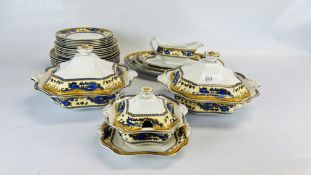 A GRIMWADES PART DINNER SERVICE, THE BORDER DECORATED WITH BLUE DRAGONS - 27 PIECES.
