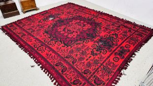 LARGE RED AND BLACK FLORAL PATTERN RUG, 310CM X 260CM.
