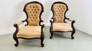 A PAIR OF VICTORIAN MAHOGANY BUTTON BACK LOW ARMCHAIRS - H 99CM.