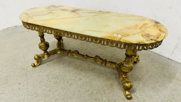 AN ELABORATE VINTAGE STYLE OCCASIONAL TABLE ON BRASS BASE WITH ONYX SET TOP,
