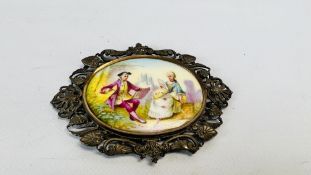 AN ELABORATE VINTAGE MIRROR THE RESERVE INSET WITH A HAND PAINTED OVAL PORCELAIN CLASSICAL SCENE